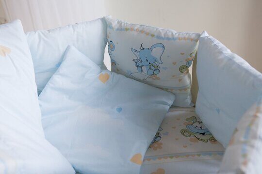 Комплект в круглую / овальную кроватку Баю-Бай Улыбка голубой (9 предметов) К91-У4