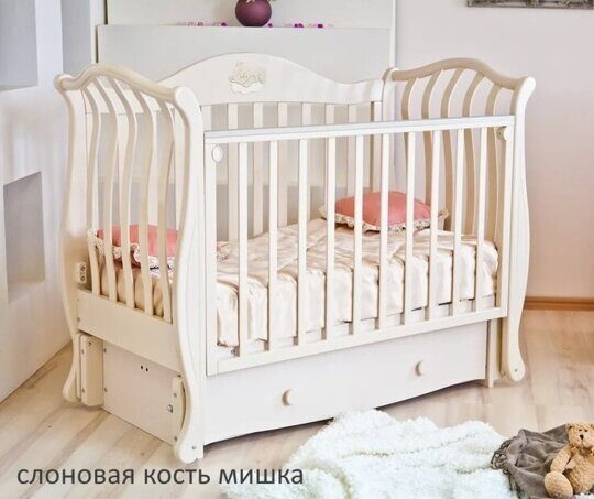 Детская кроватка Красная Звезда ЮЛИАНА С-757 слоновая кость продольный маятник
