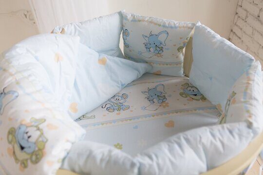 Комплект в круглую / овальную кроватку Баю-Бай Улыбка голубой (9 предметов) К91-У4